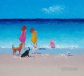 girls and dogs at beach